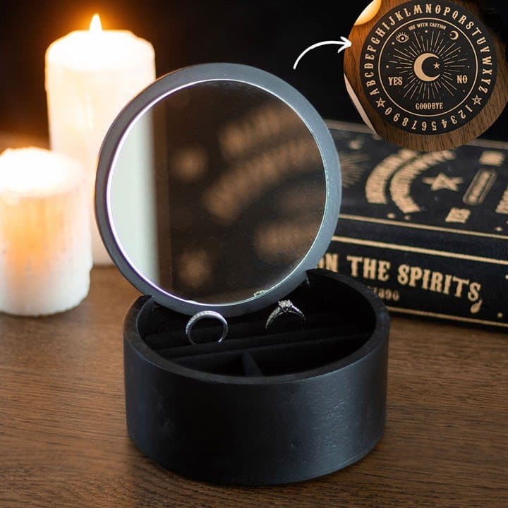 Black jewellery box with a gold talking board design and a mirror in the lid