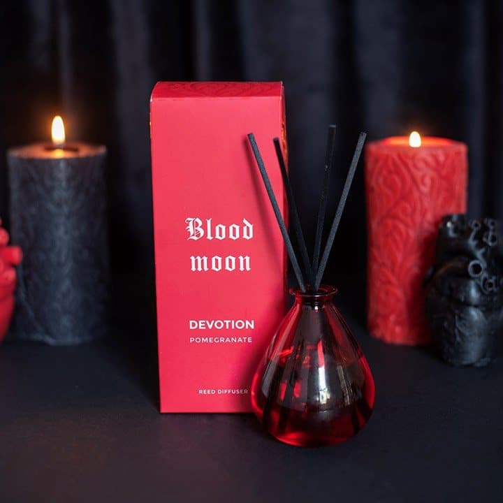 Blood Moon pomegranate glass reed diffuser labelled Devotion
