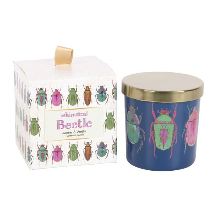 Blue glass candle with a colourful beetle design and gold lid