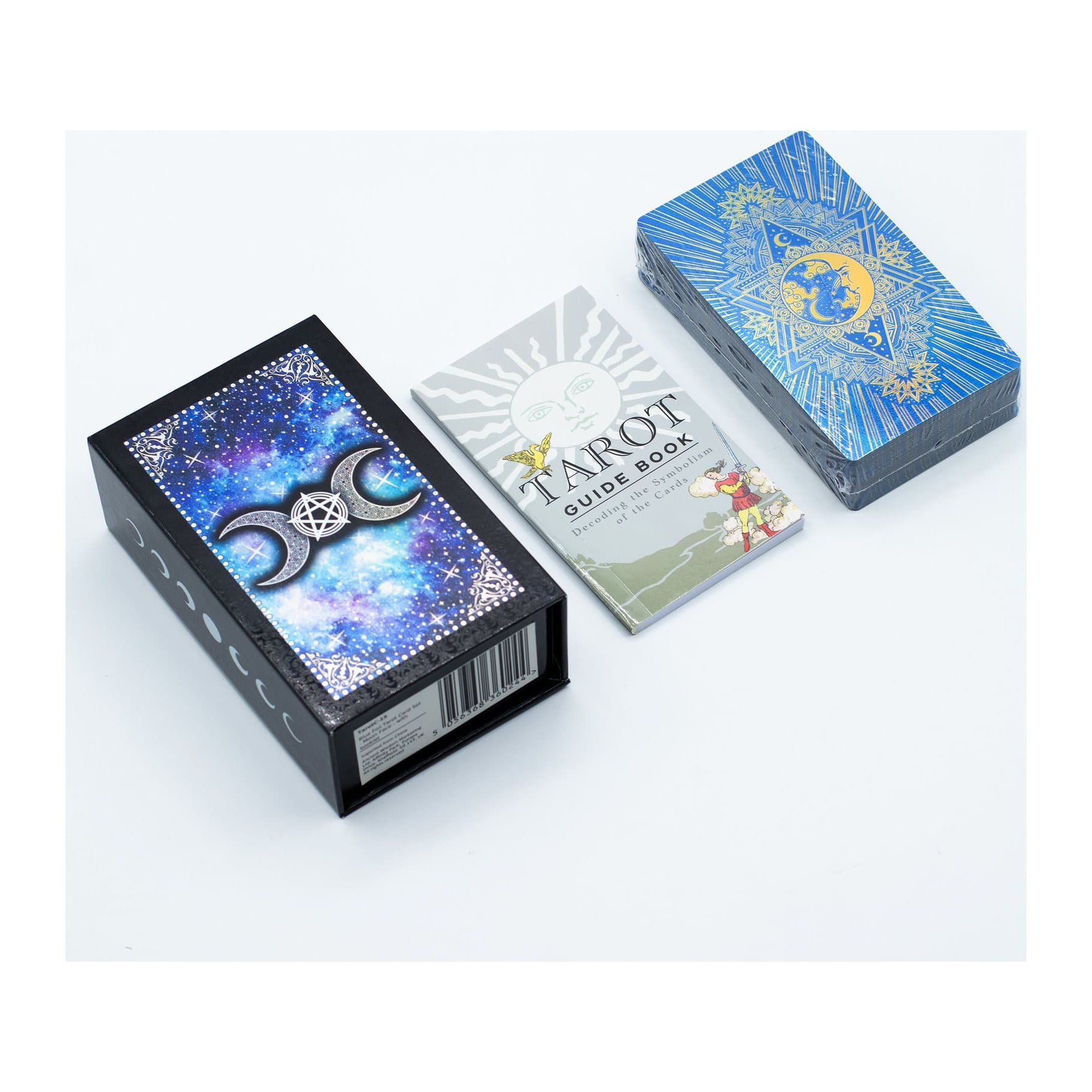 Blue foil Moon Face tarot card set with a guidebook