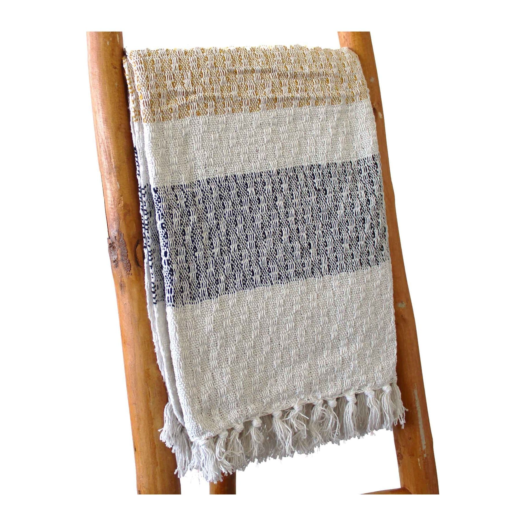 Cream cotton throw with golden accents, deep grey stripes and tasselled edges