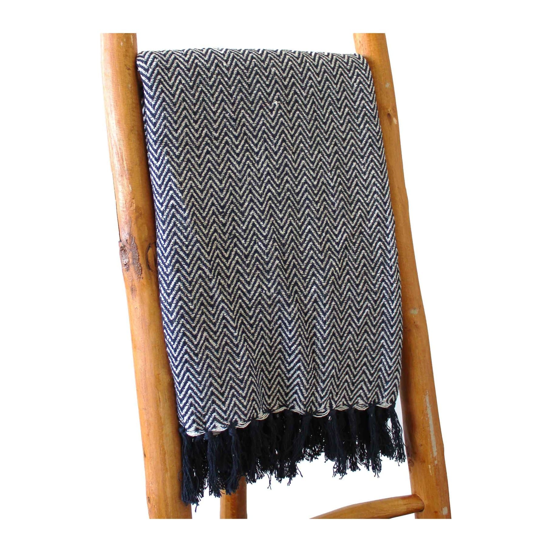 Navy zigzag cotton throw with tasselled edges