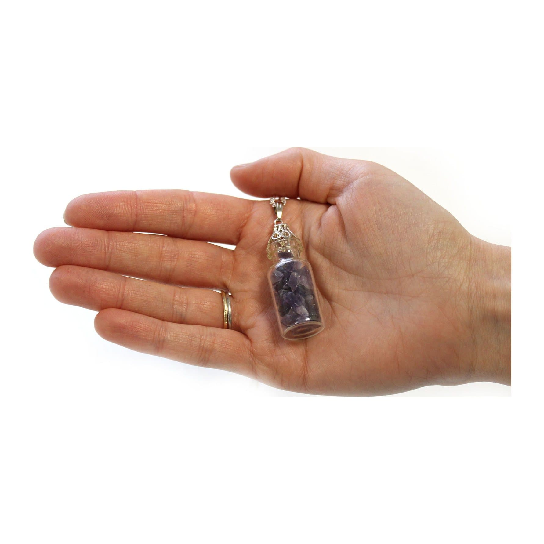 Amethyst gemstone necklace with tiny amethyst stones in a small bottle
