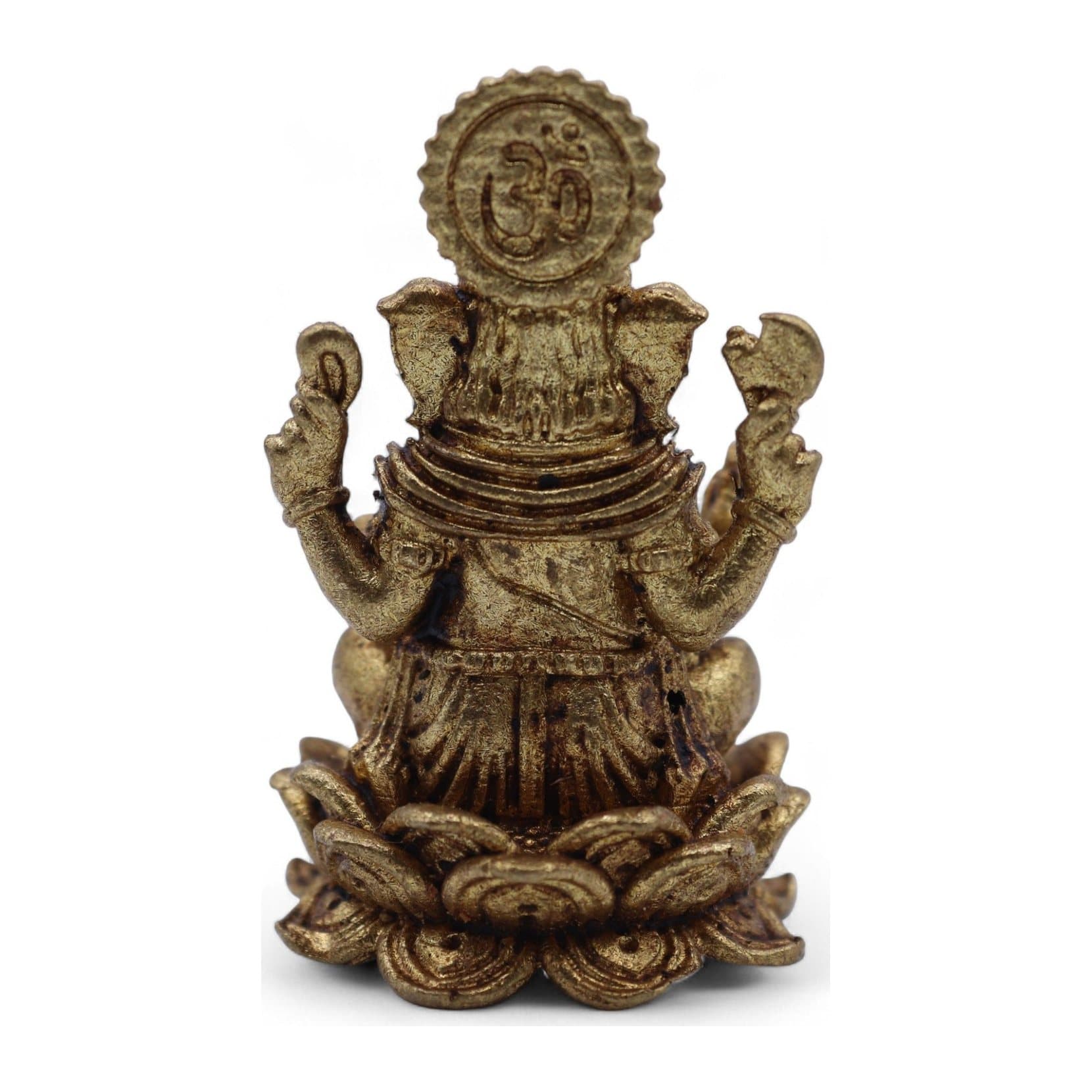 Small solid brass Ganesha figurine seated on a lotus base