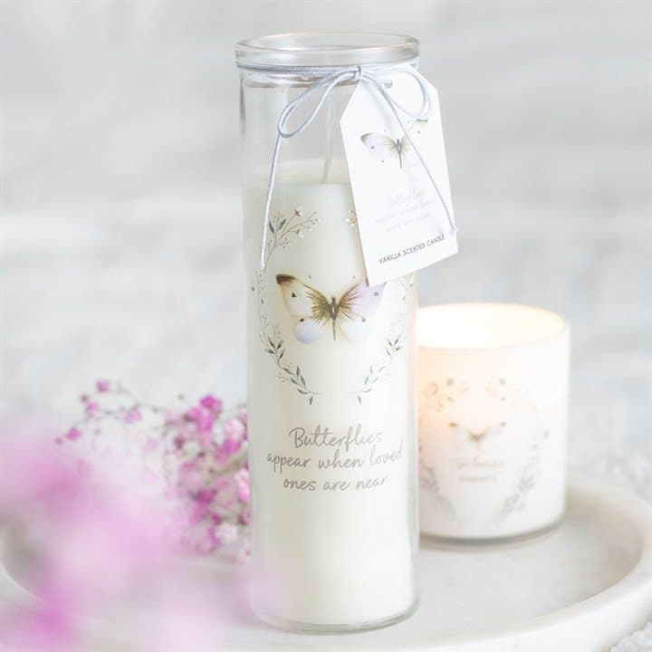 Vanilla tube candle with a butterfly motif and a loved ones message