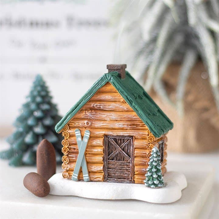 Ski chalet incense holder with smoke from the chimney