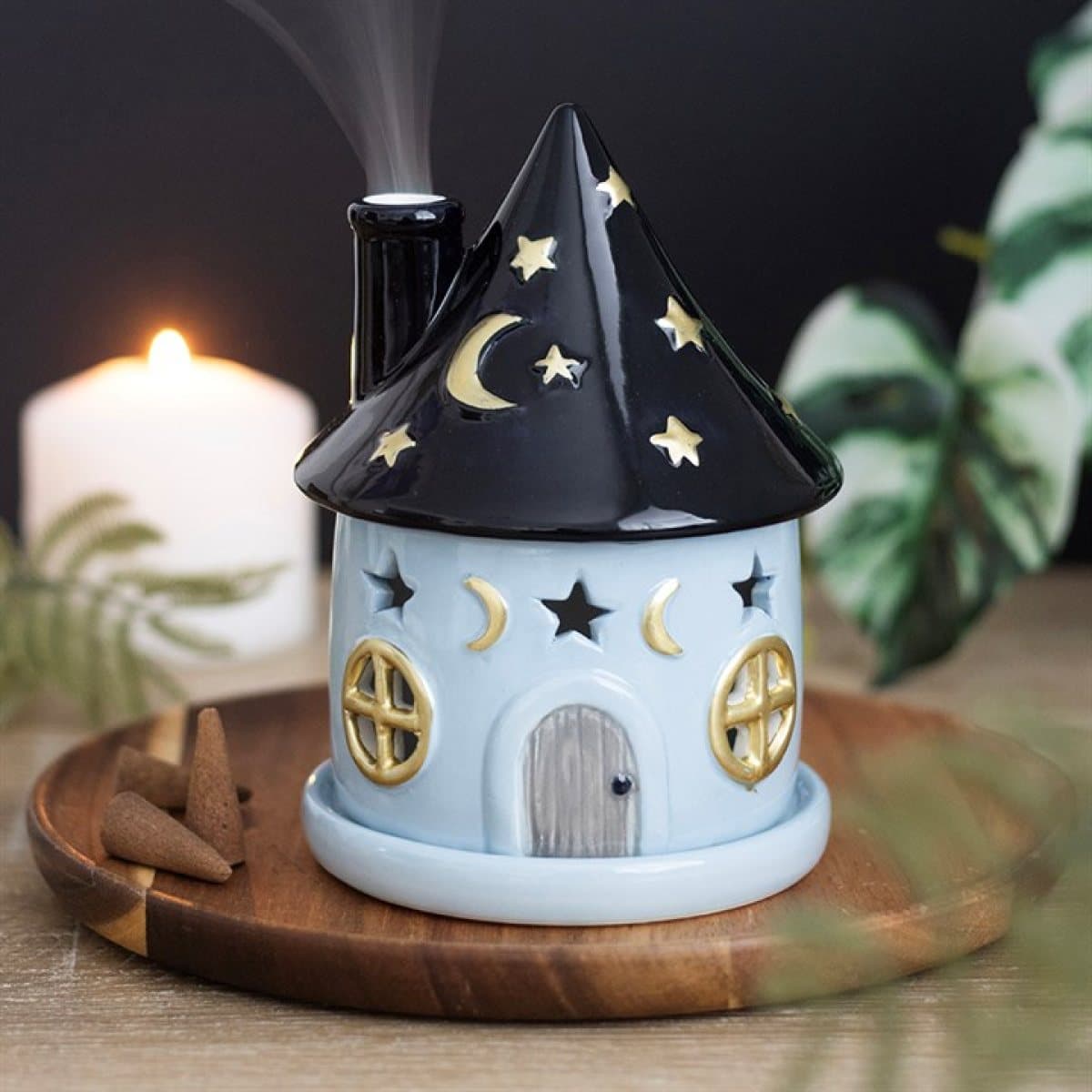 Ceramic cottage incense cone holder with a starry roof and crescent moons