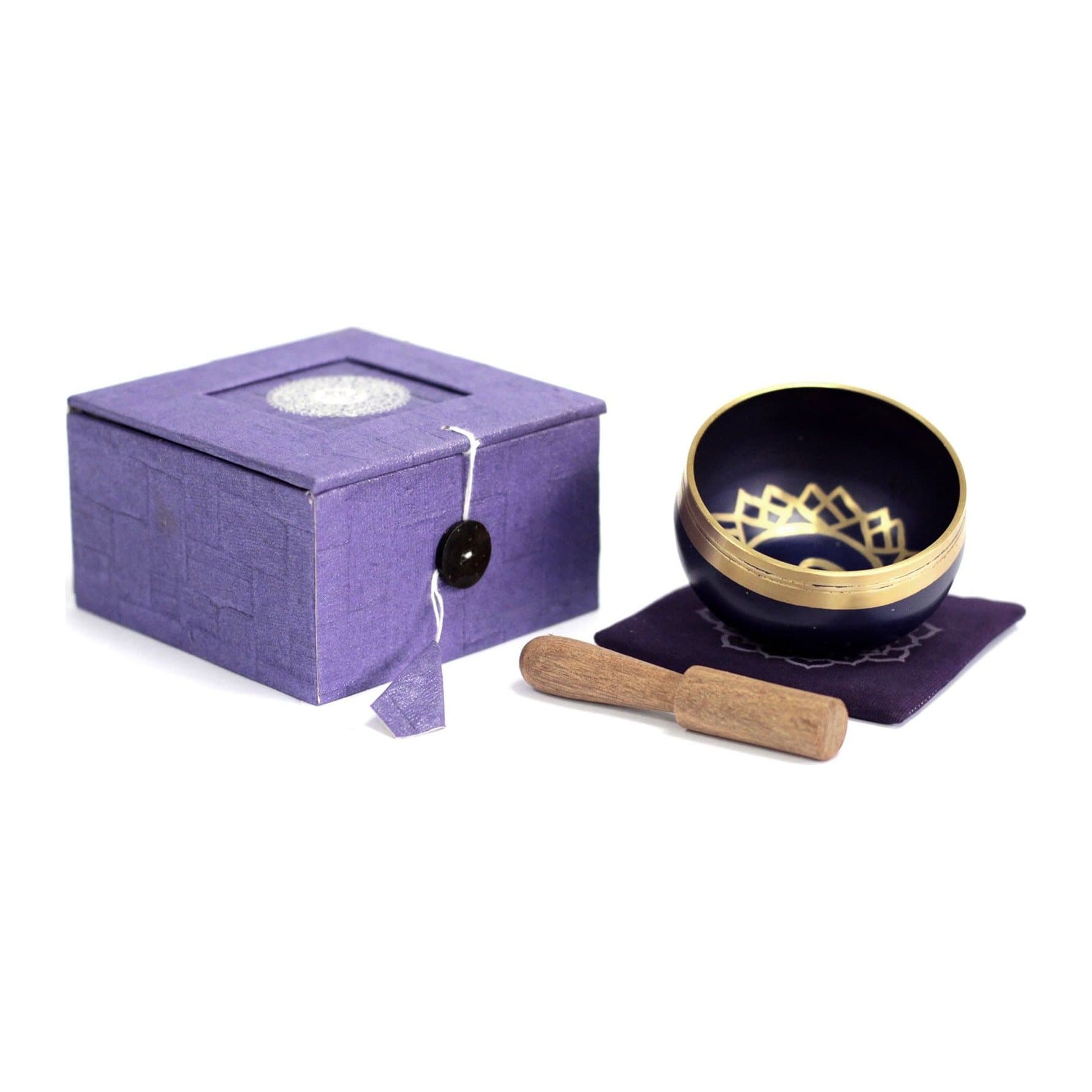 Brass crown chakra singing bowl with a wooden stick