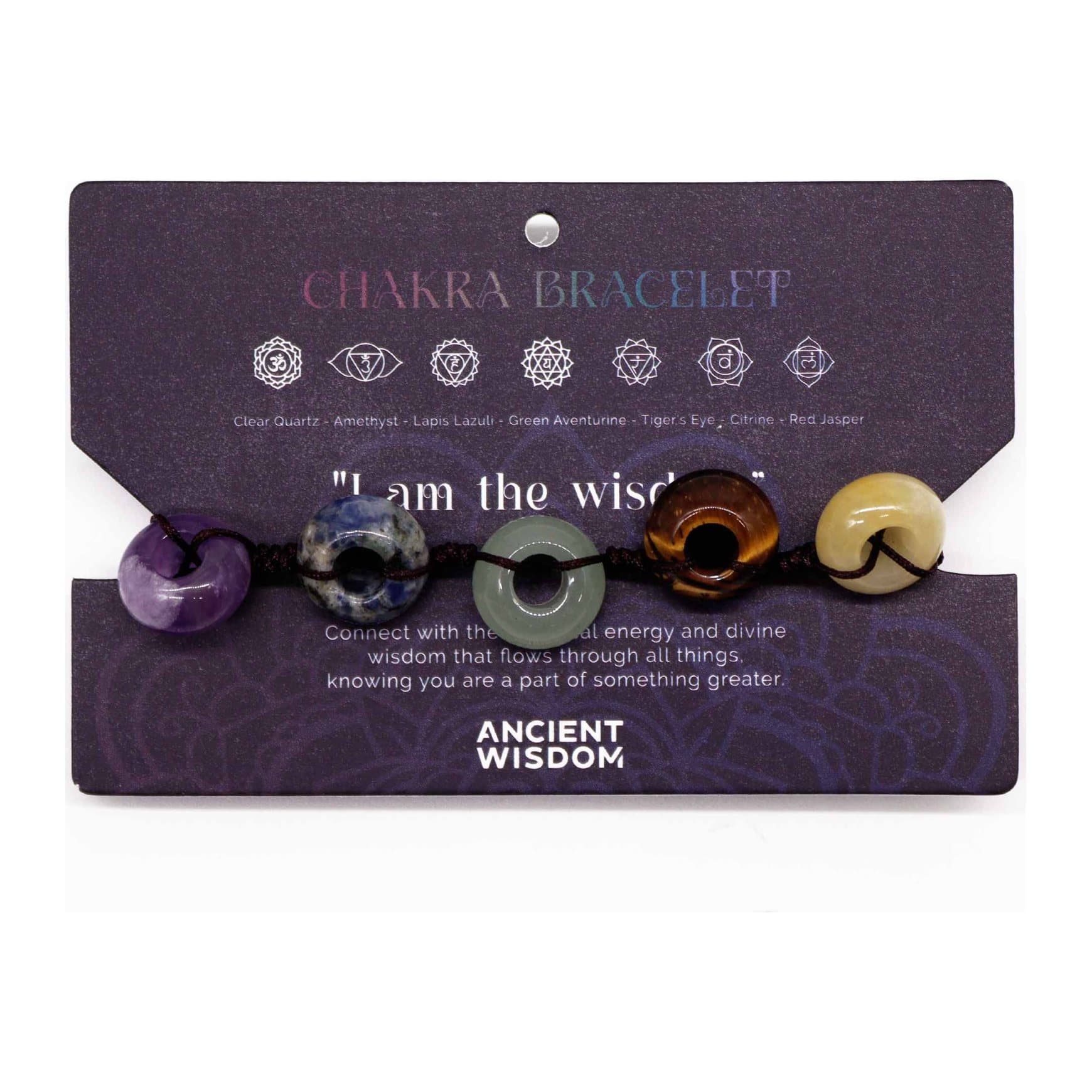 Chakra string bracelet with smooth ball-shaped gemstones on a header card