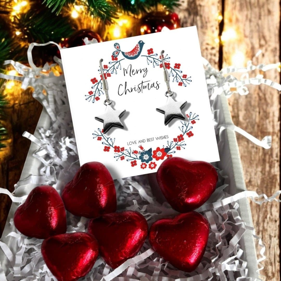 Christmas star mini gift hamper with silver star earrings and chocolate hearts