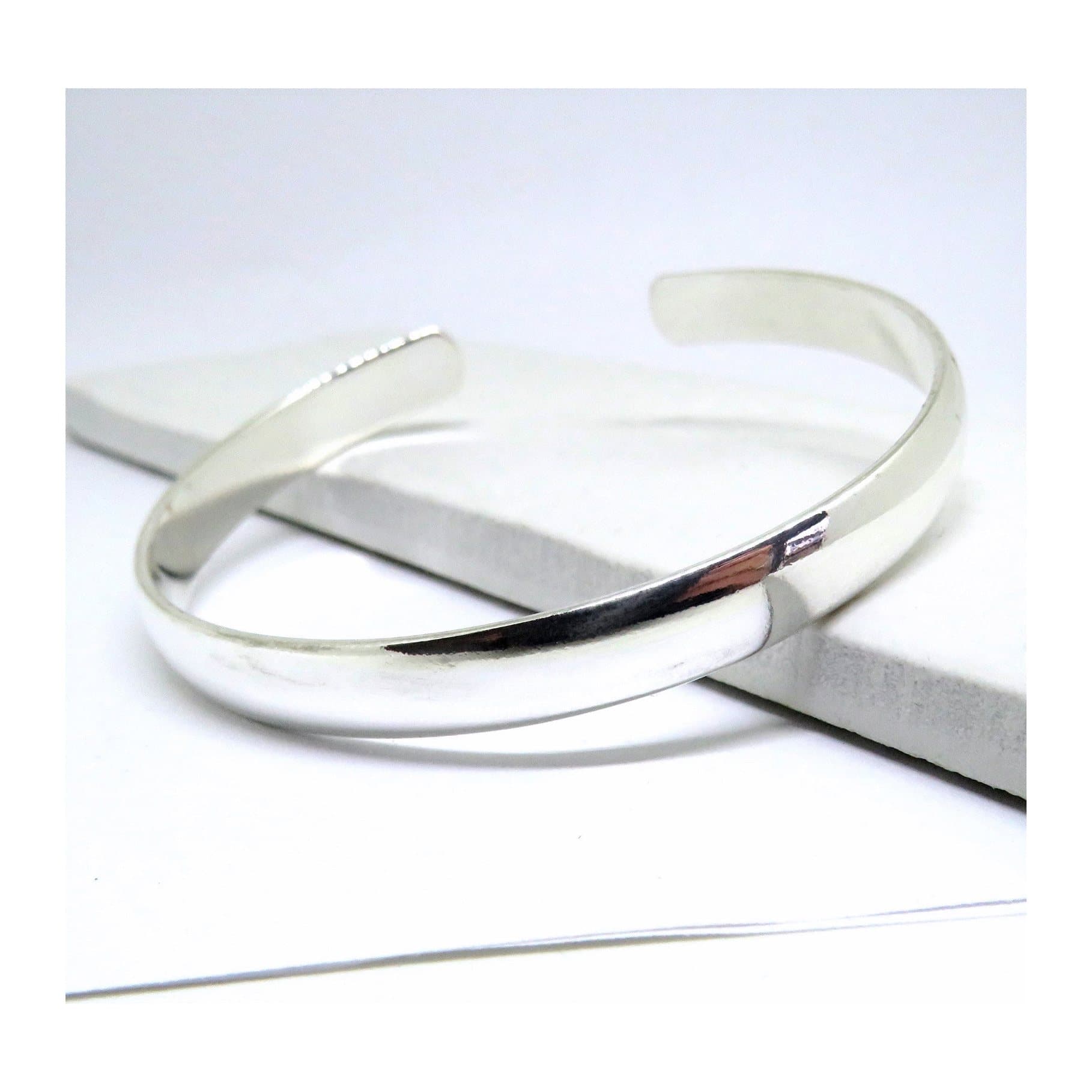 Chunky silver bangle for women, plain design