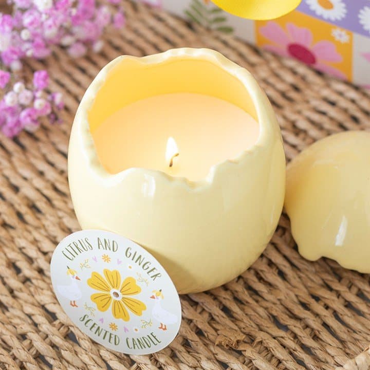 Candle shaped like a cracked yellow egg