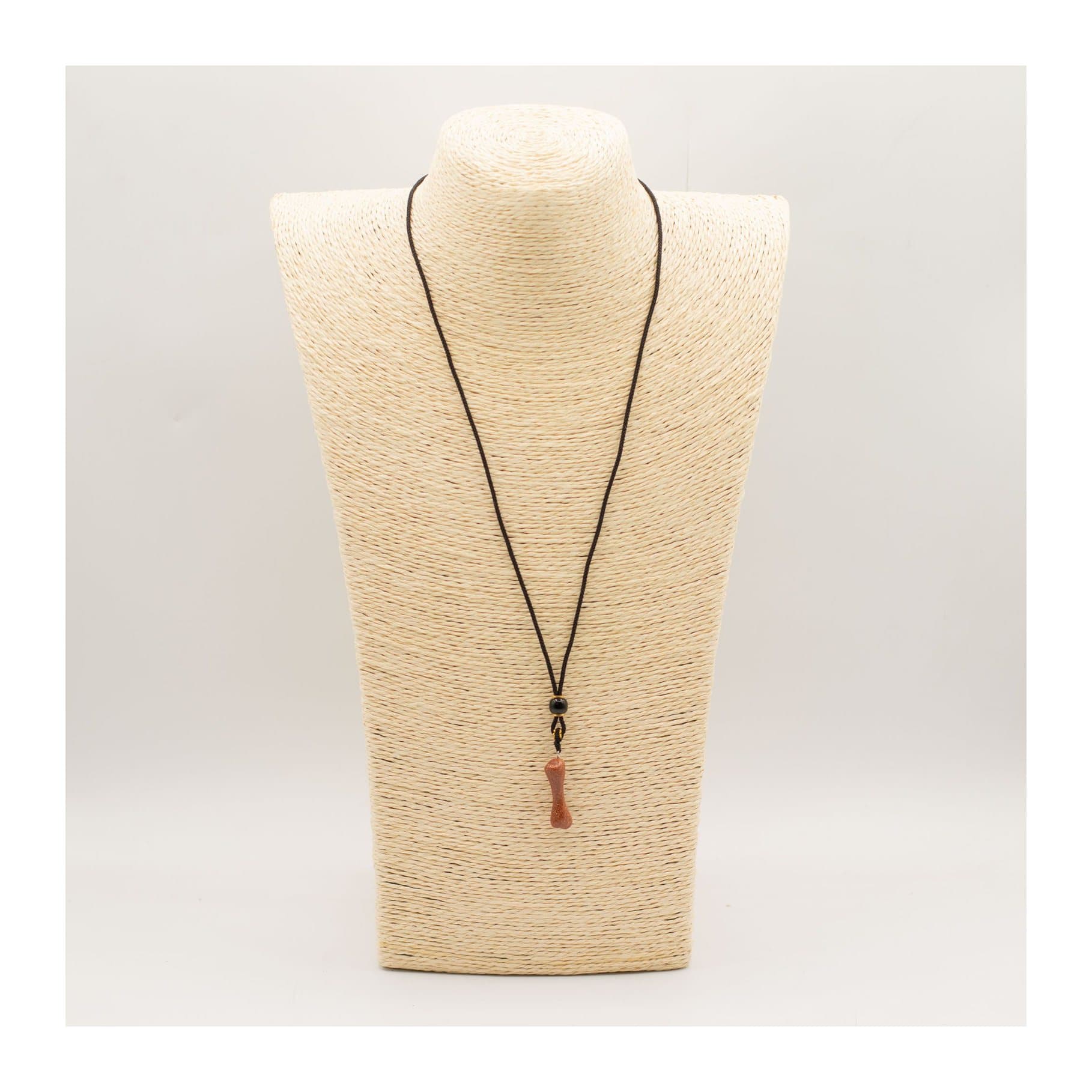 Goldstone bone pendant on a black adjustable cord necklace