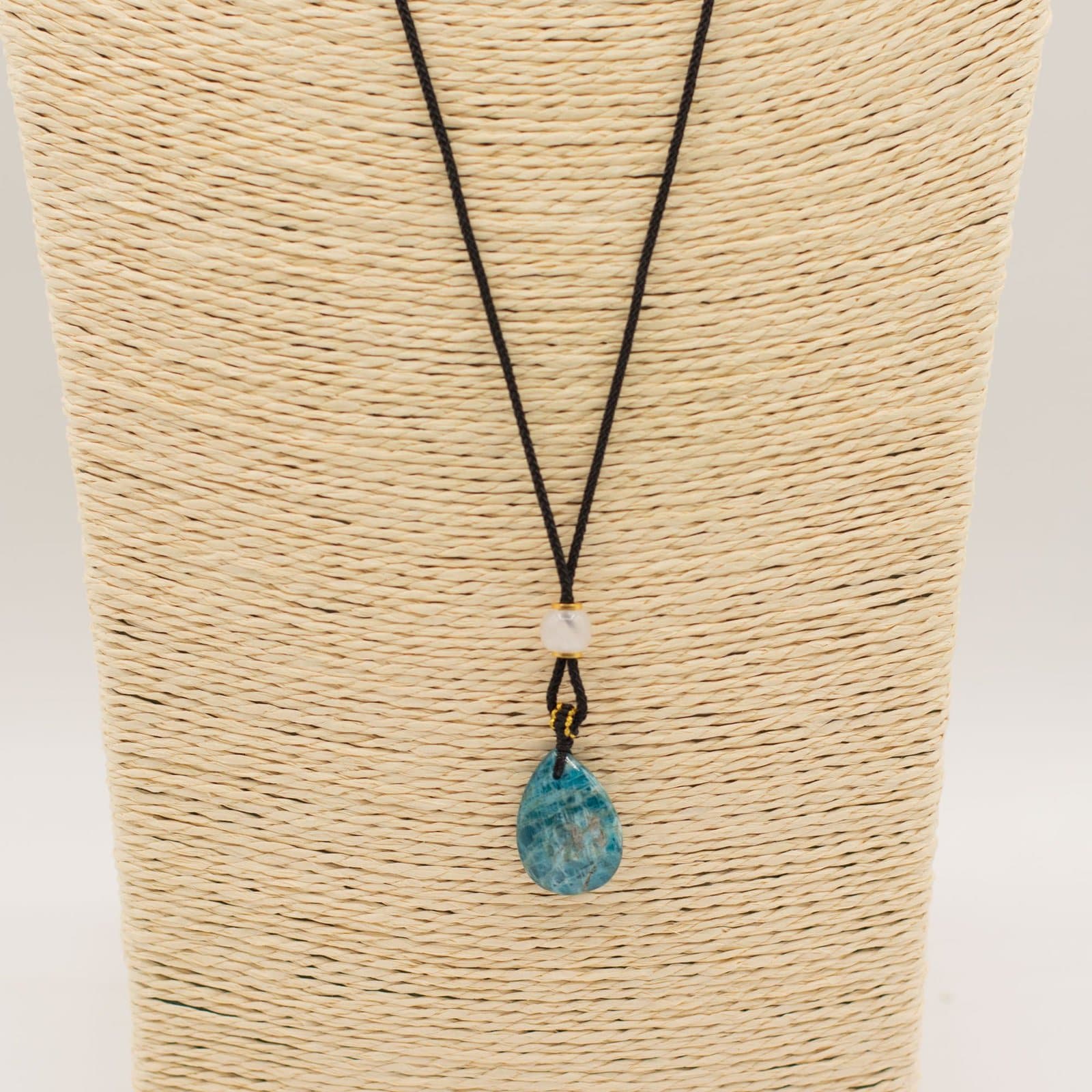 Howlite teardrop pendant necklace on a black cord
