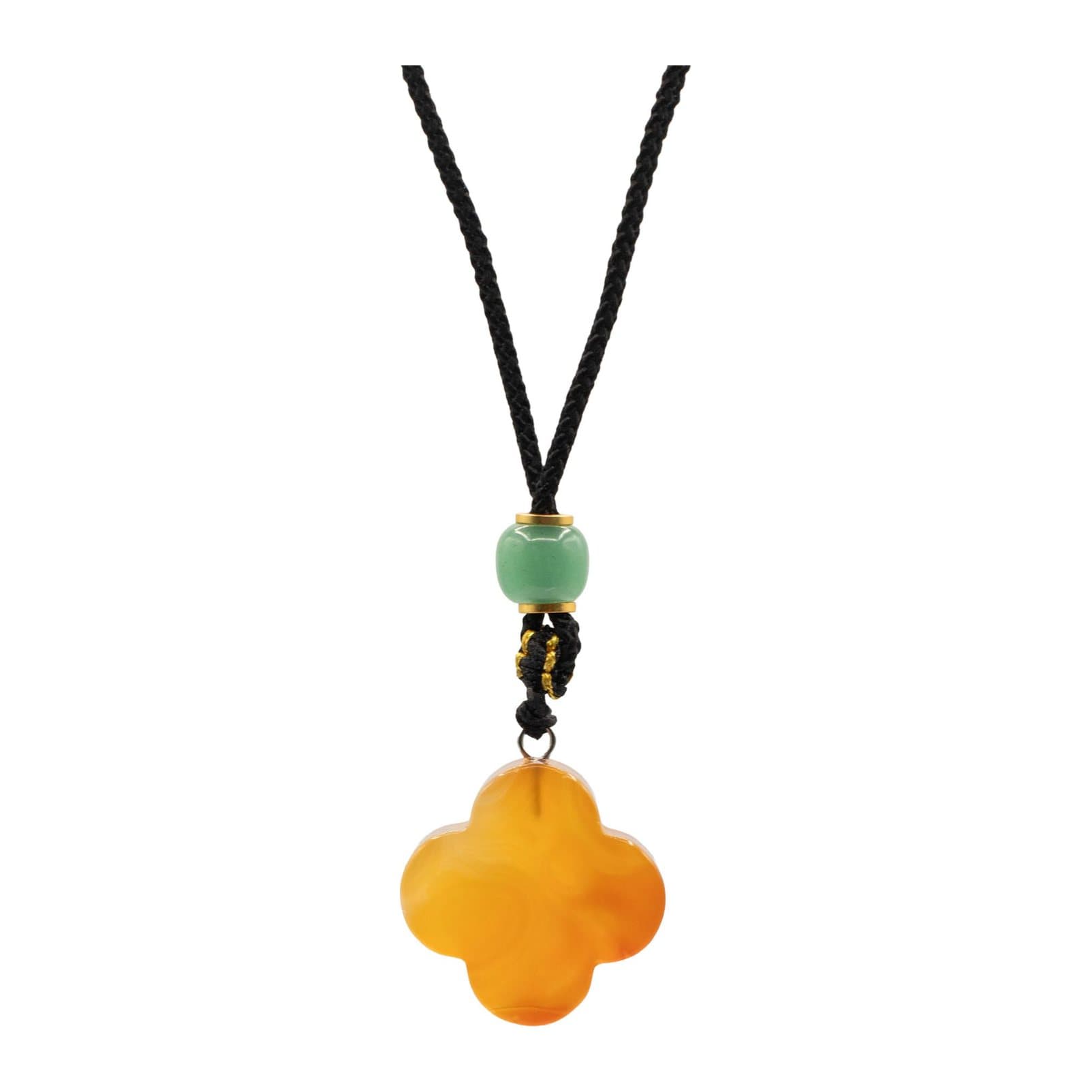 Red jade four-leaf clover gemstone pendant on an adjustable cord
