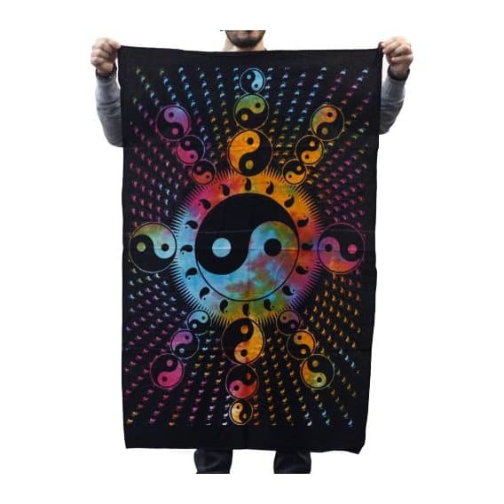 Cotton wall hanging with a bright Yin Yang and radiating patterns on a black background