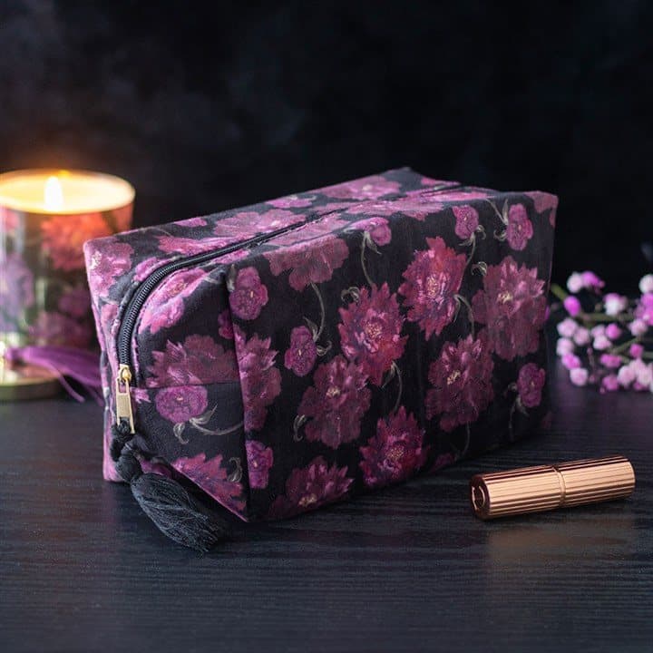 Dark romance floral print makeup bag with a hang tag