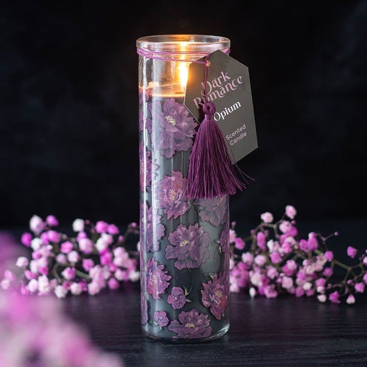Dark romance opium scented tube candle with a hang tag