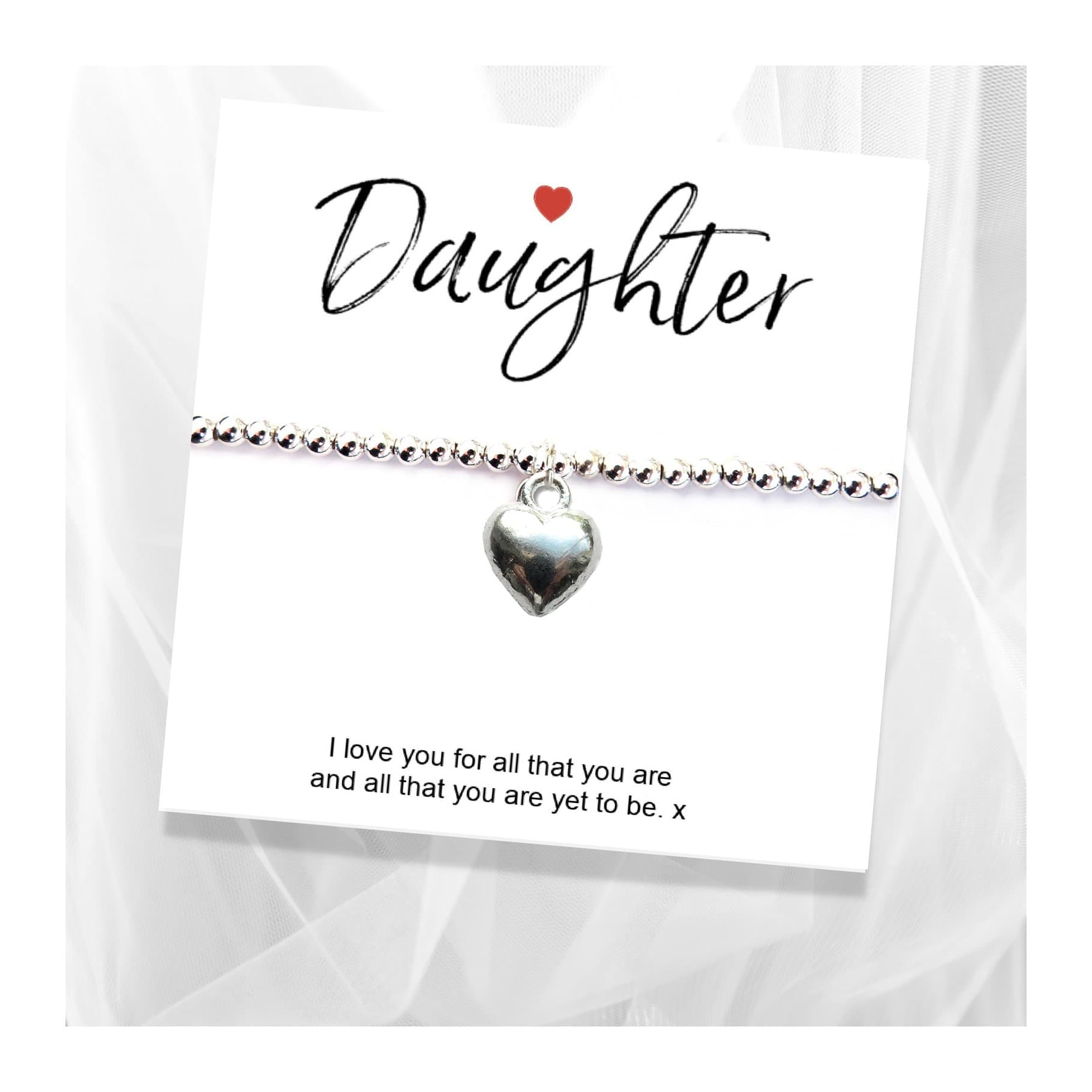 Silver heart charm stretch bracelet presented on a gift card with a message for a daughter