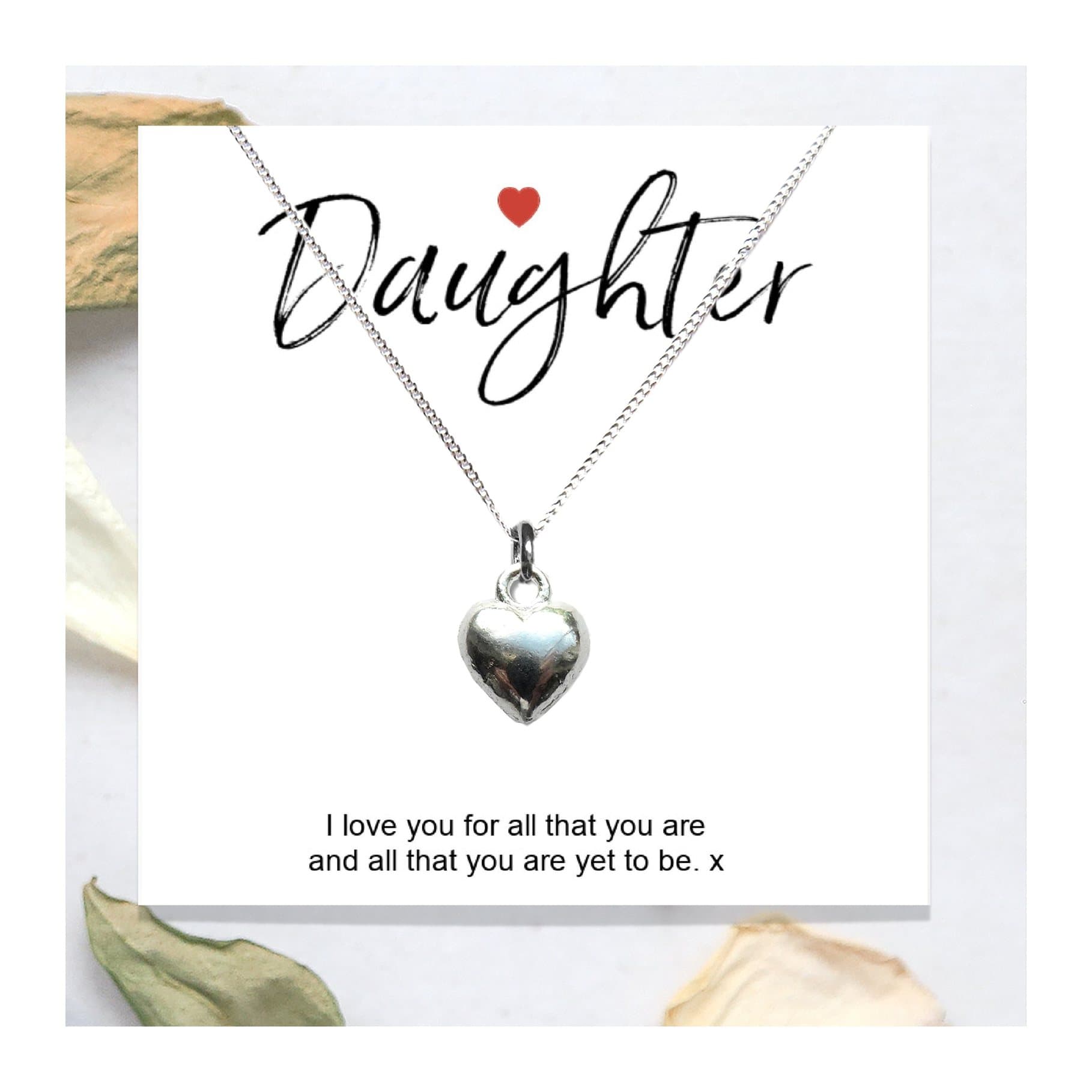 Heart necklace on a gift card reading Daughter I love you