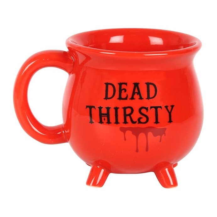 Red cauldron-shaped mug with the words Dead Thirsty