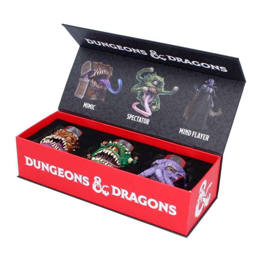 Three D&D shot cups: a green beholder, a Mimic and a purple Mind Flayer
