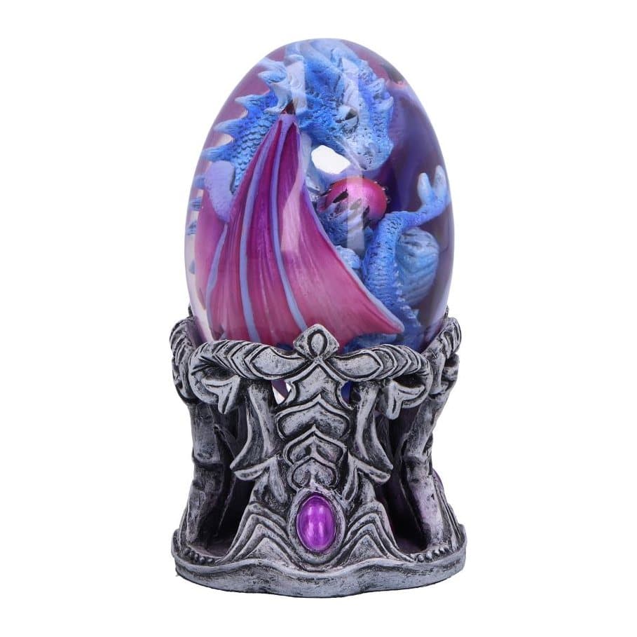 Blue water dragon with purple wings inside a clear egg on a silver and purple stand