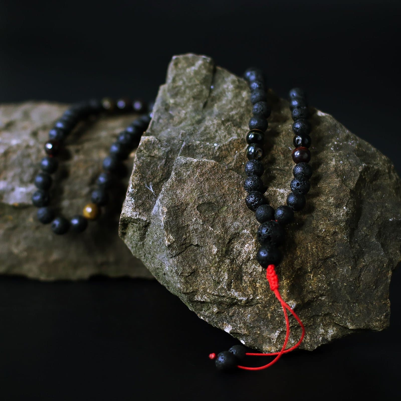 Lava stone necklace with Tiger's Eye beads and red cord