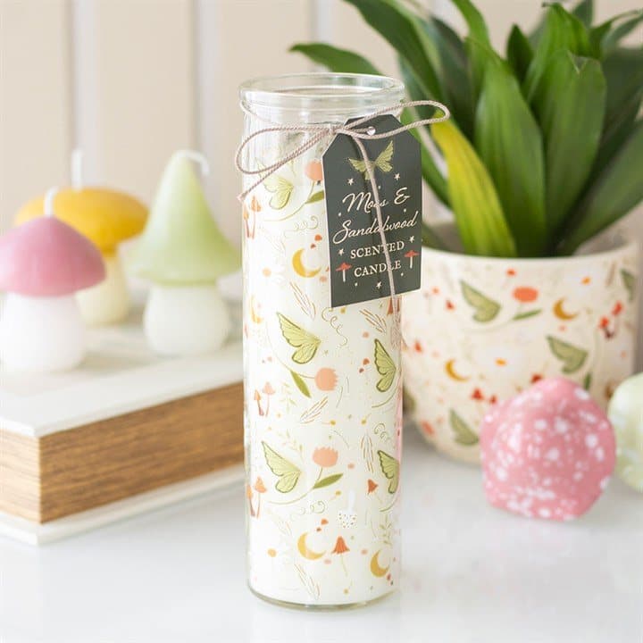 Printed glass tube candle inspired by fairies with a hang tag