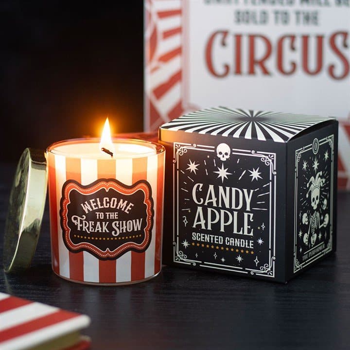Red and white striped Candy Apple candle jar with Freak Show label