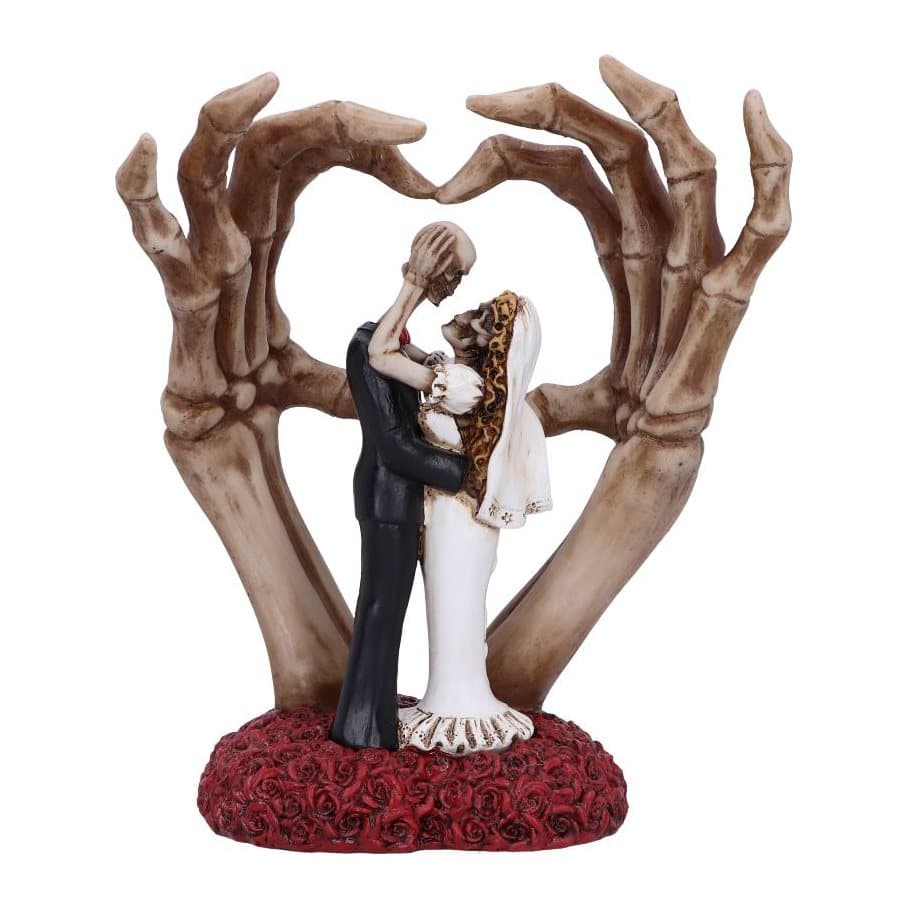 Skeleton groom embracing his bride on blood-red roses with a heart behind