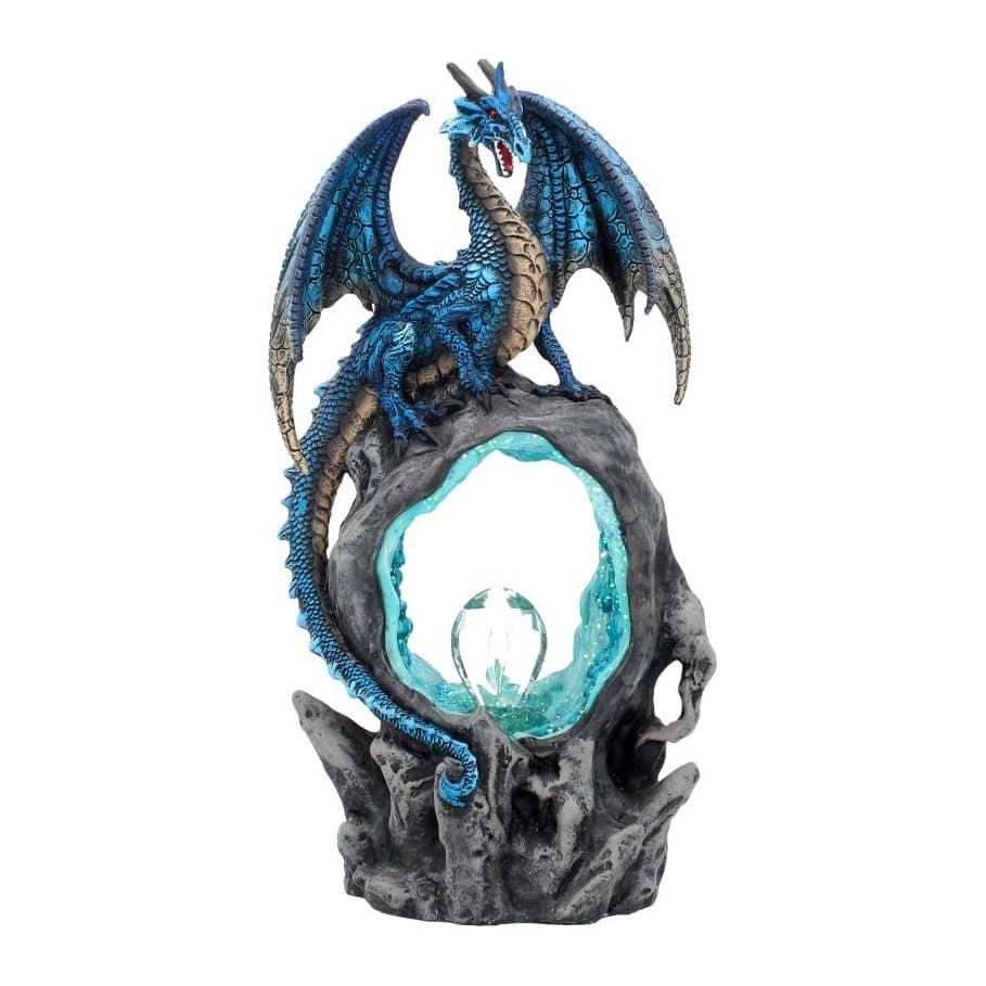 Blue dragon figurine with raised wings guarding a grey geode of sapphire crystals