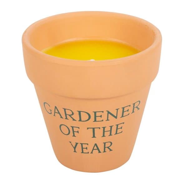 Citronella candle in a ceramic plant pot with Gardener of the Year text