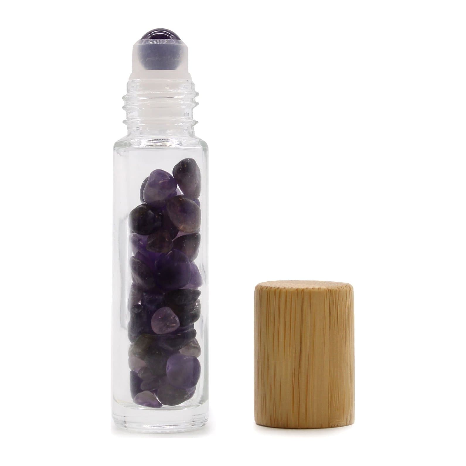 Two amethyst gemstone roller bottles with wooden caps
