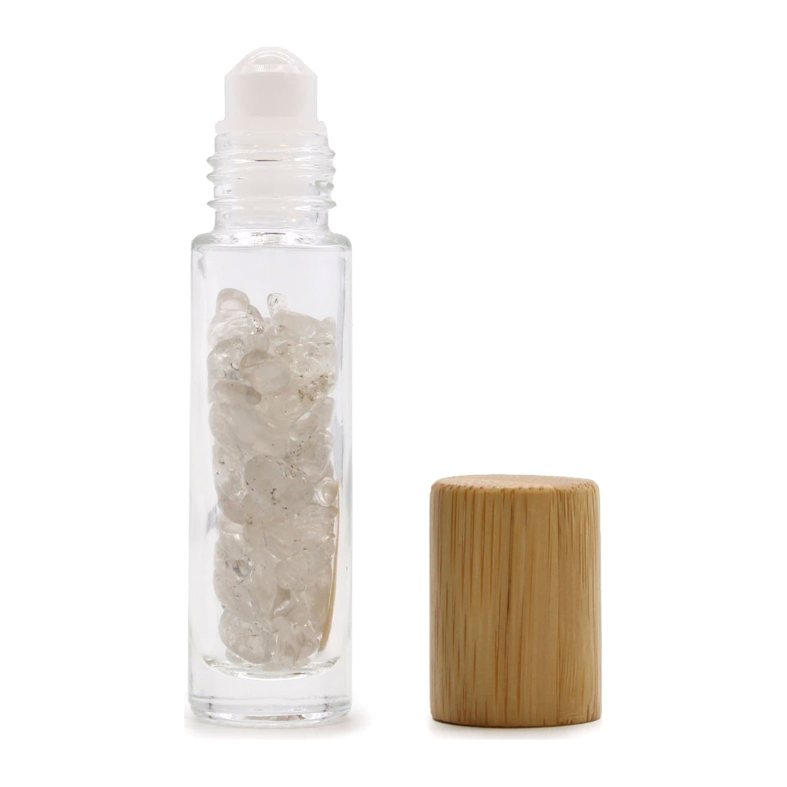 Glass roller bottle with a polished rock quartz ball and a wooden cap