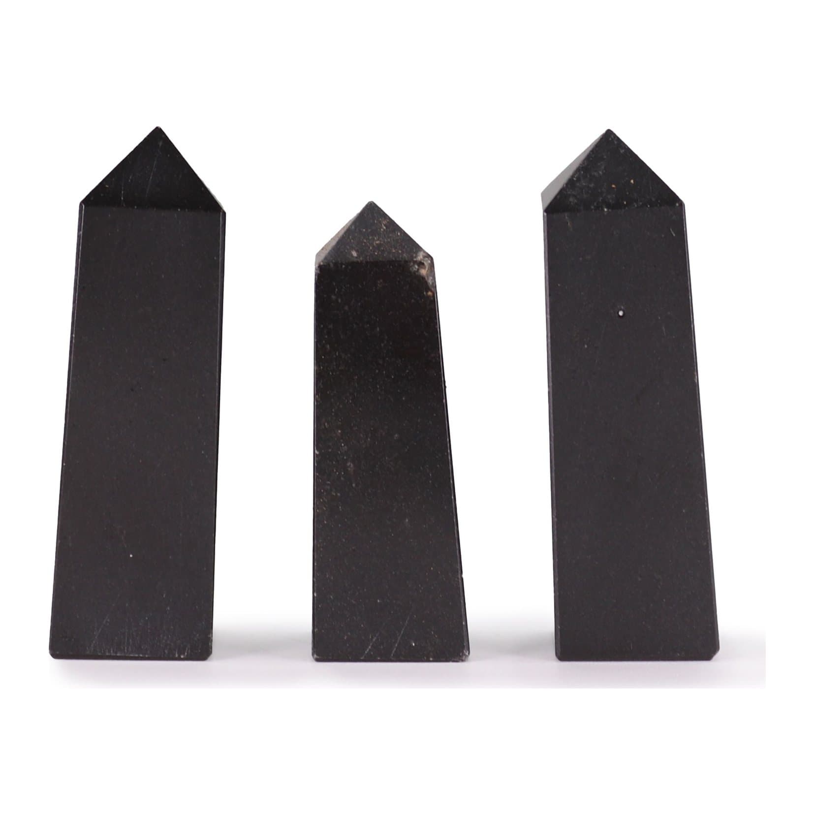 Polished tourmaline gemstone obelisk point, approx 5 cm