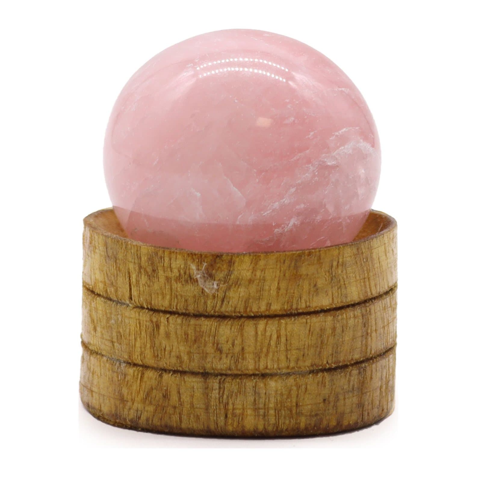 Polished rose quartz sphere on a stand