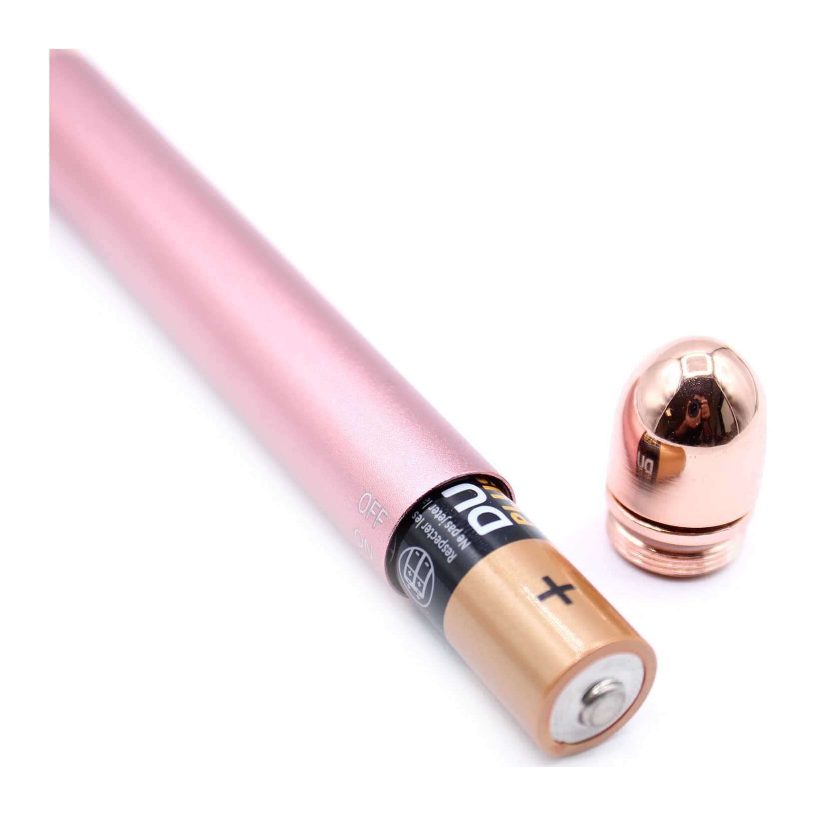 Handheld rose quartz vibration pad with a pink stone head and rose-gold-toned body