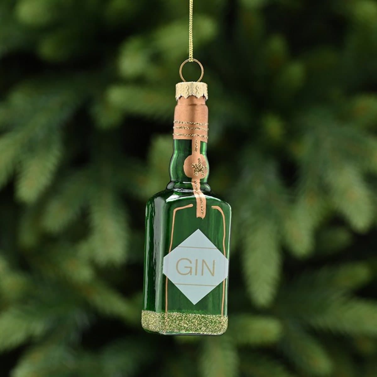 Glass Christmas decoration shaped like a green gin bottle