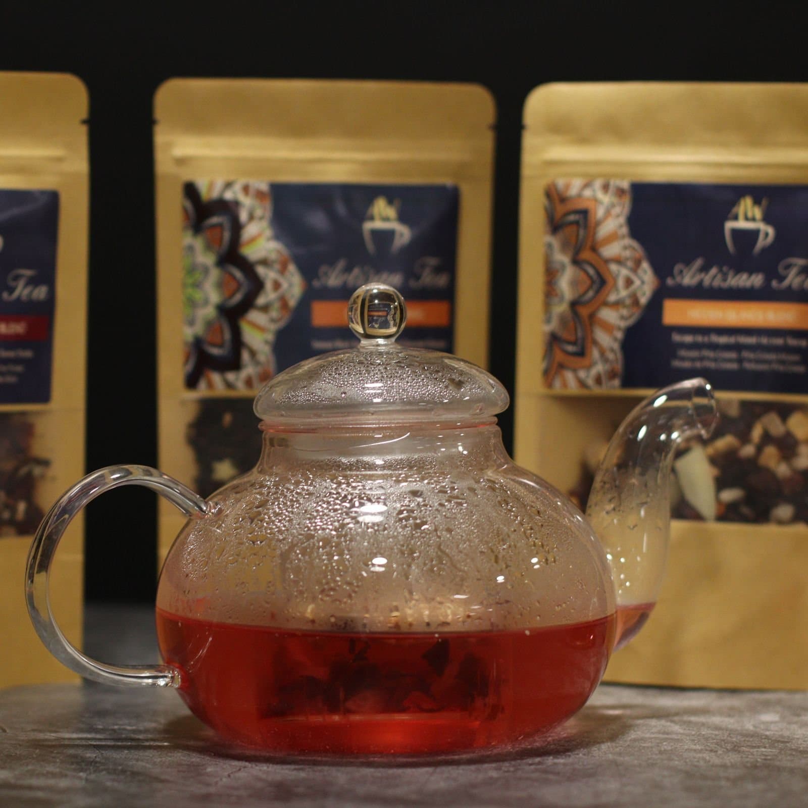 Clear glass infuser teapot in a gift box