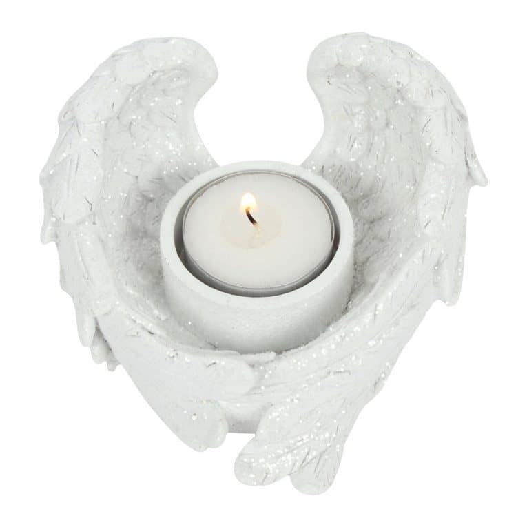 Angel wing candle holder dusted in clear glitter flakes
