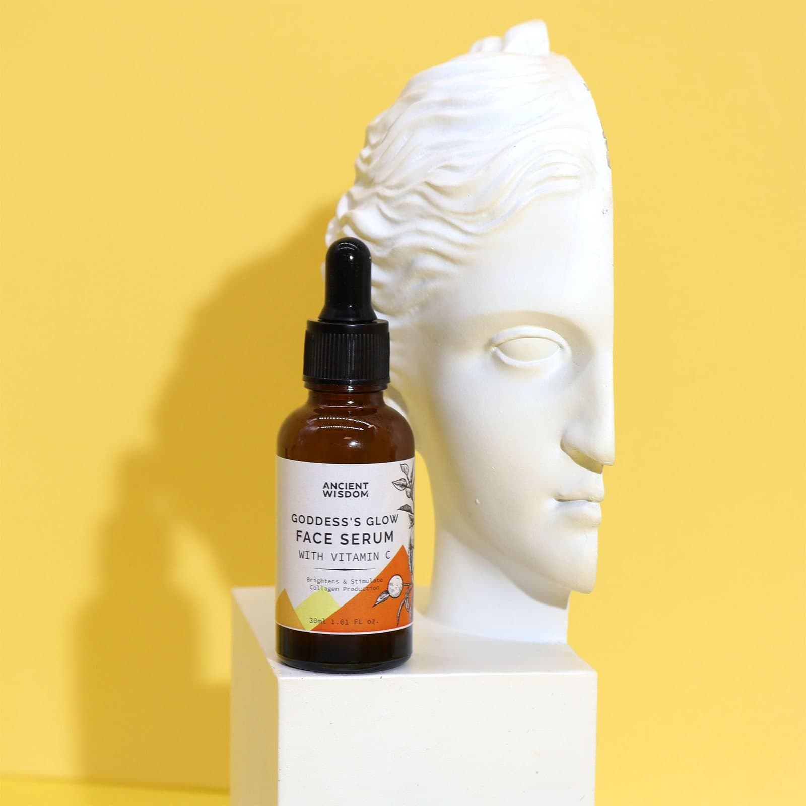 Amber glass dropper bottle of Goddess's Glow vitamin C face serum