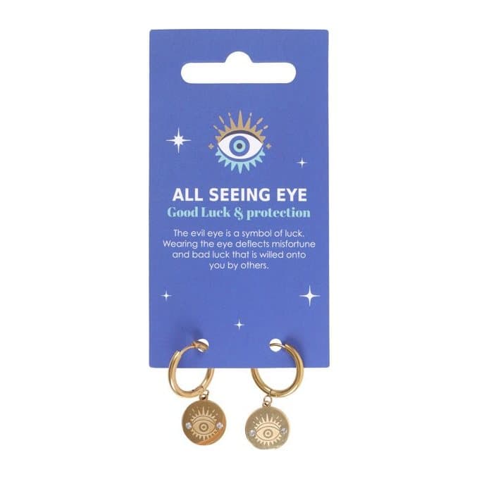 Gold-toned All Seeing Eye earrings on a blue card