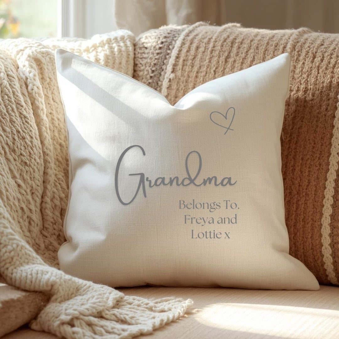Cream cushion with a 'Grandma Est. 2026' design