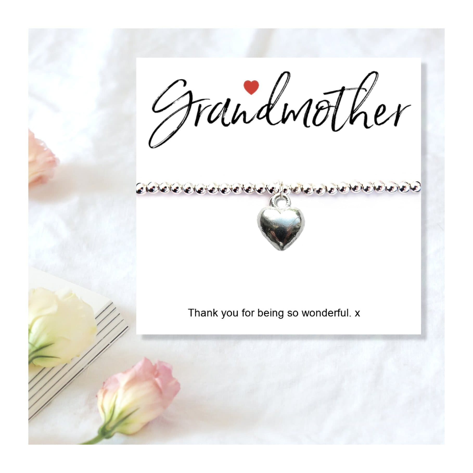 Silver heart charm stretch bracelet on a Grandmother message gift card