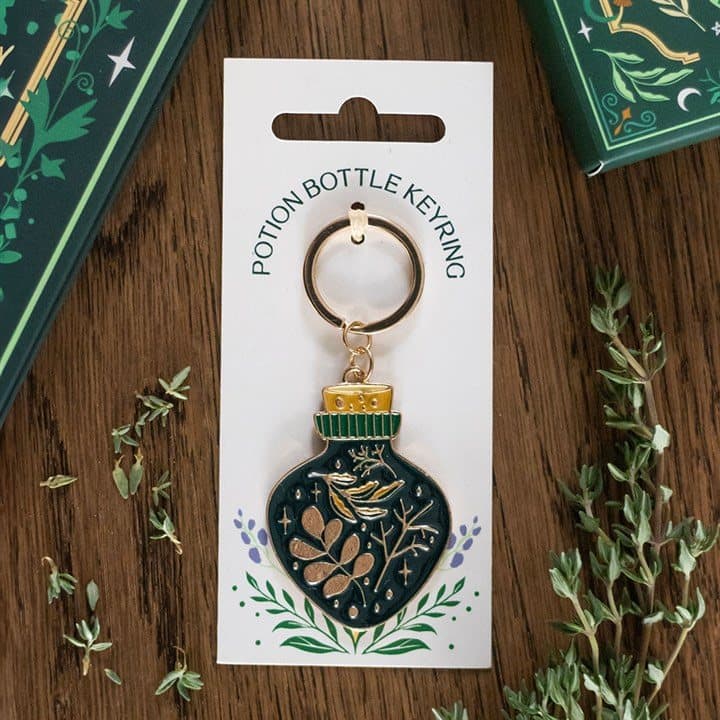 Green witch potion bottle keyring in green enamel and gold-tone metal
