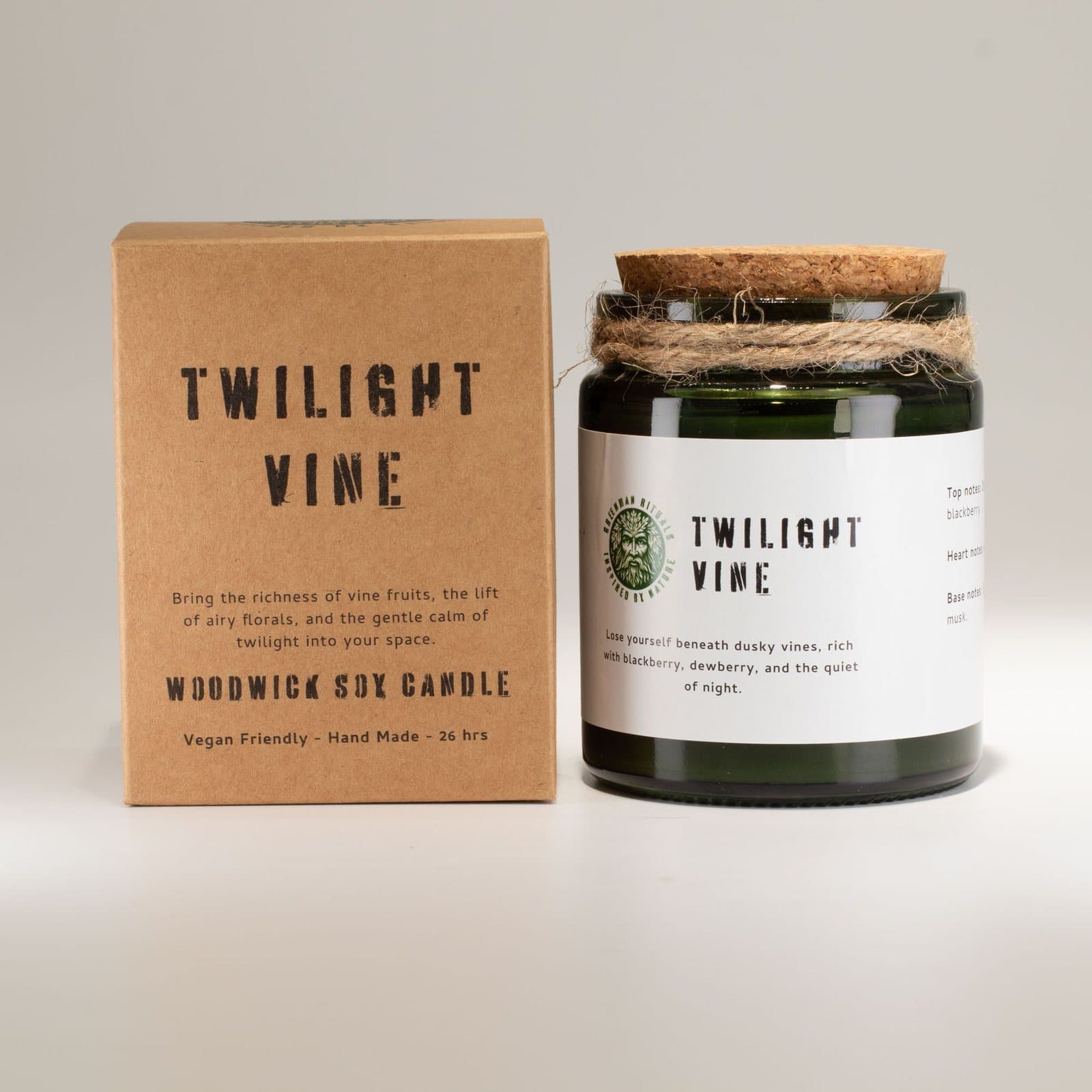 Twilight Vine woodwick soy candle in a green glass jar