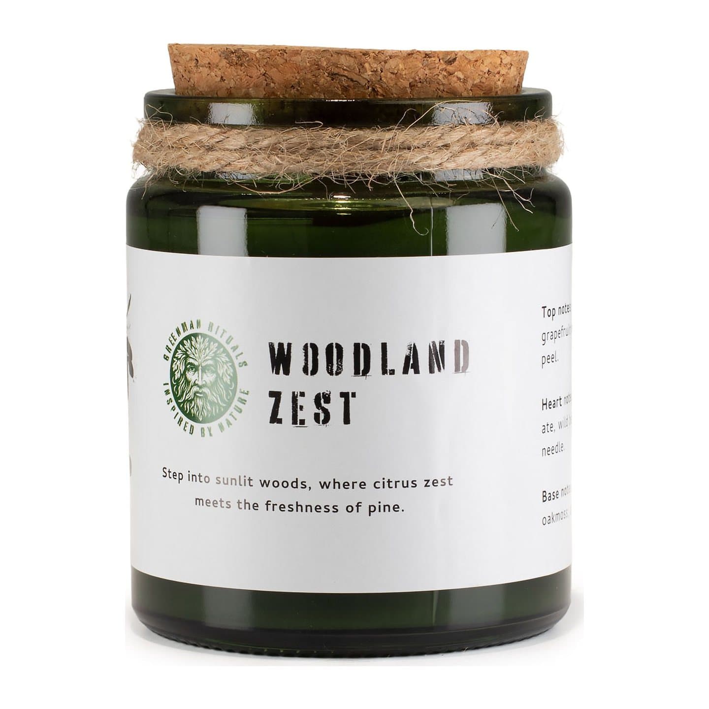 Woodland Zest woodwick soy candle in a green glass jar with a cork lid
