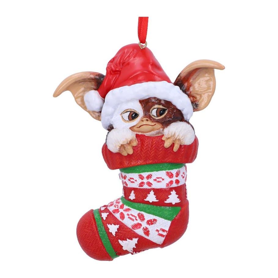 Gremlins Gizmo Christmas ornament with a Santa hat, hanging in a fair isle stocking