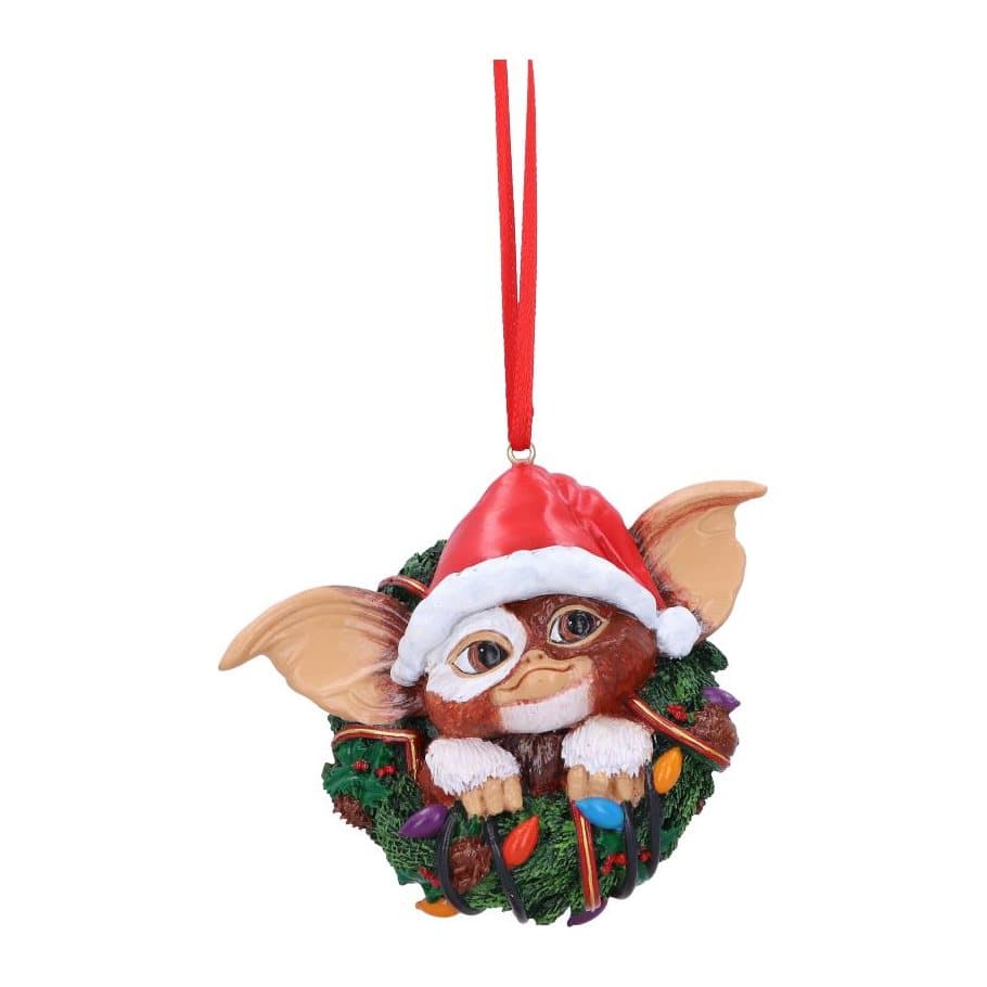 Gizmo Mogwai ornament in a Christmas wreath decorated with fairy lights